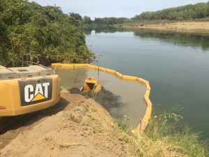 Maintaining water quality during installation with silt curtain